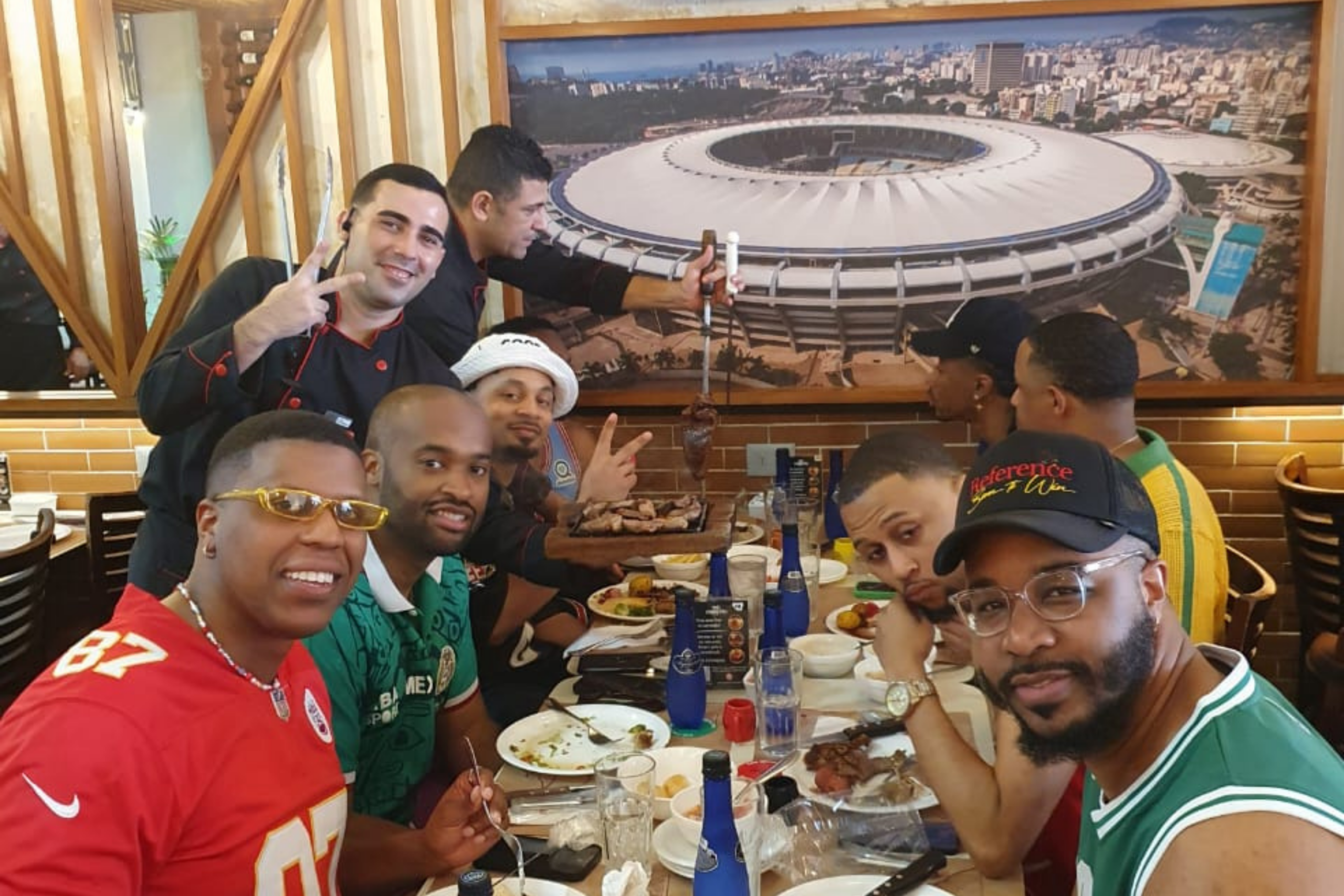 Bachelor party group enjoying a Brazilian barbecue dinner in Rio de Janeiro